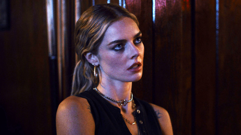 Edie looking fed up in Eenie Meanie