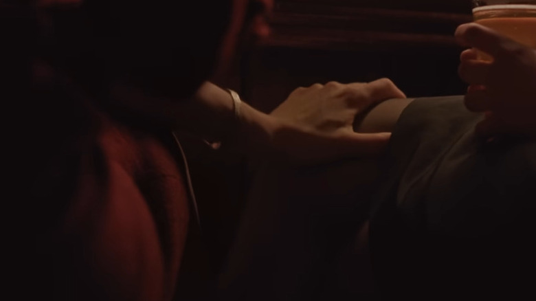 Eileen 2023 Film Hand Leg Anne Hathaway Thomasin Mckenzie