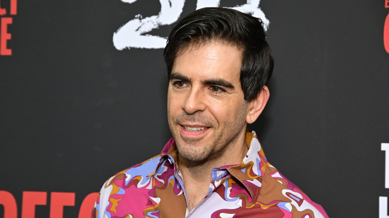 Eli Roth wearing a patterned shirt