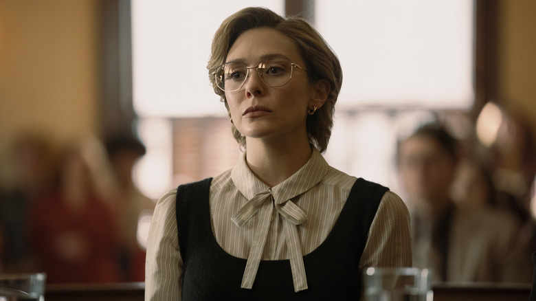 Candy during her trial wearing glasses and a blouse in Love & Death