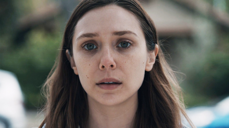 Elizabeth Olsen's Leigh Shaw looks concerned in closeup in Sorry for Your Loss