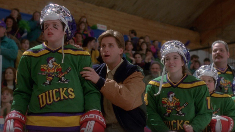 Emilio Estevez as Gordon Bombay looking at the hockey match in the Mighty Ducks