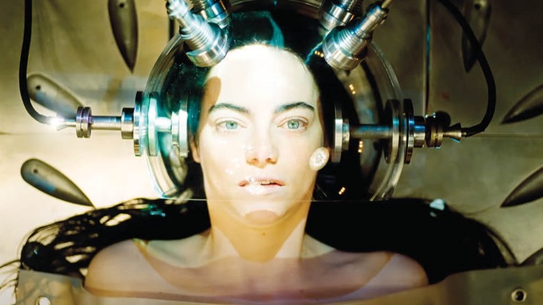 Bella Baxter in an electric head contraption in Poor Things