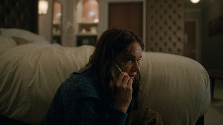 Ruth Wilson's Sarah Trafford crouches behind a bed in Down Cemetery Road