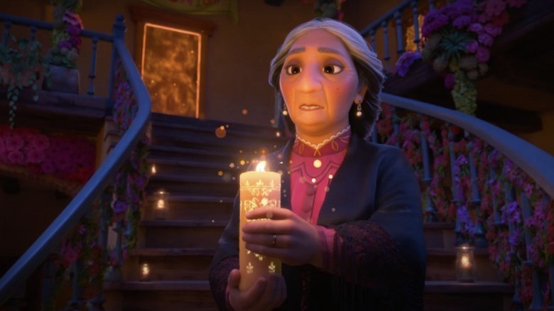 Abuela Alma Madrigal holds the family's magical candle