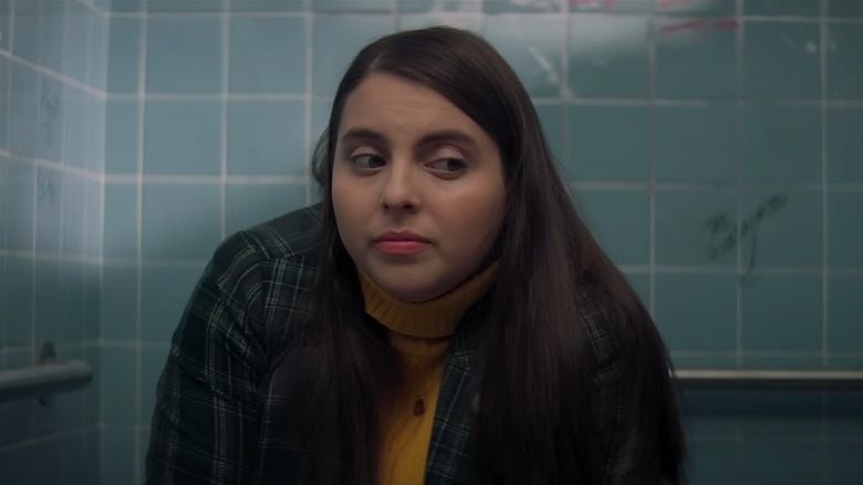 Molly Davidson sitting in a bathroom