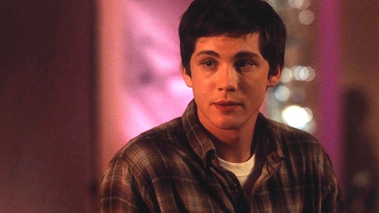 Charlie Kelmeckis wearing a plaid shirt