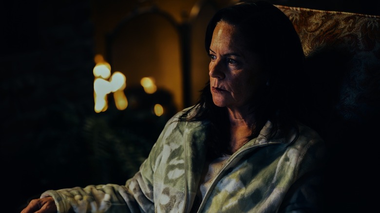 Laurie (Martha Kelly) sitting in a chair on Euphoria