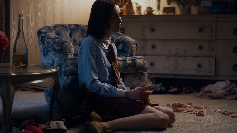 Lexi (Maude Apatow) sitting on the floor in Euphoria