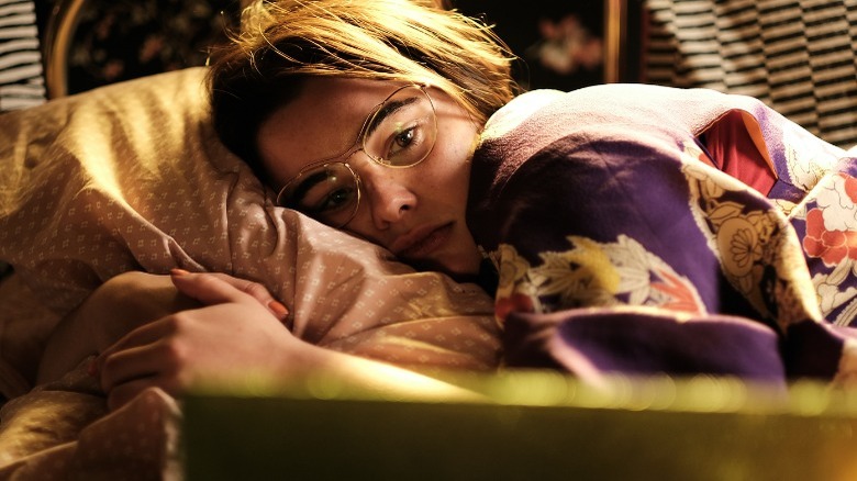 Kat in bed watching laptop