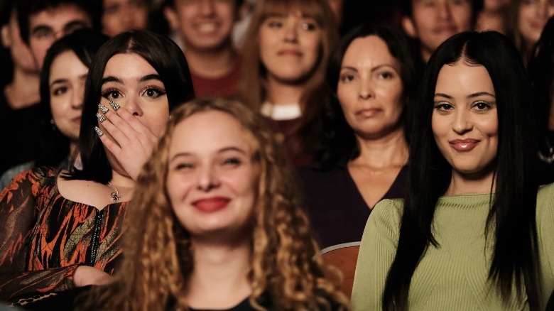 Kat gasping Maddy smirking audience