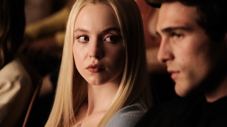 Cassie looking at Nate