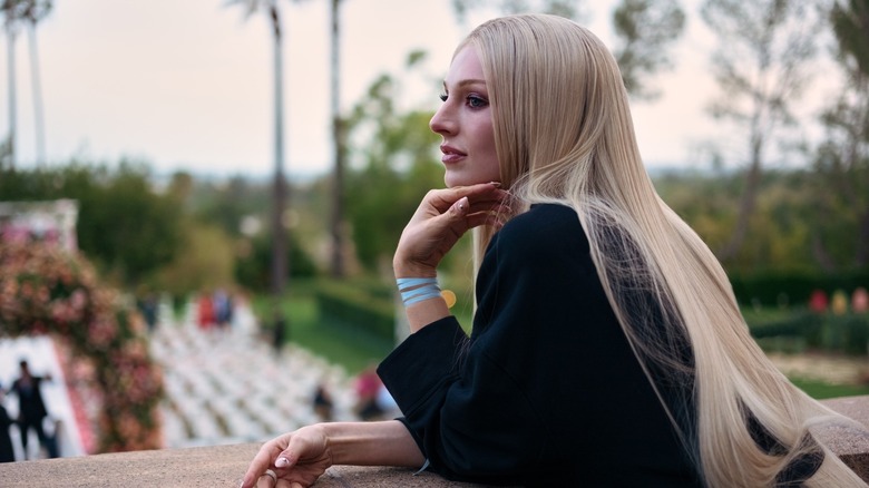 Jules wearing a jacket and looking over her shoulder on Euphoria