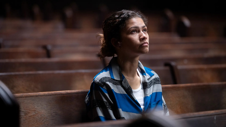 Rue (Zendaya) sits in a church pew in Euphoria season 3