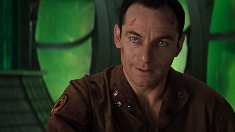 Jason Isaacs against green background in Event Horizon