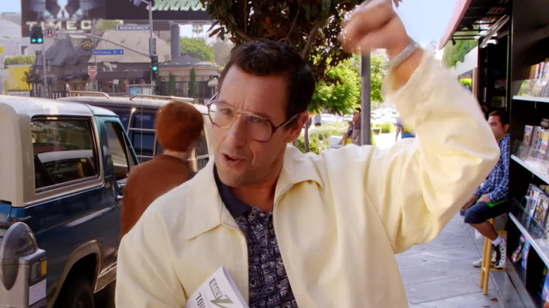 Adam Sandler fist pumping in Sandy Wexler
