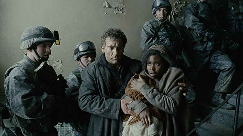 Theo escorting Kee and her newborn