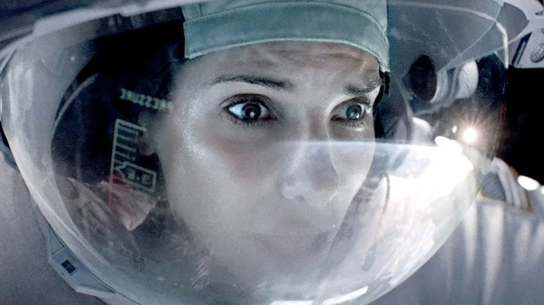 Sandra Bullock breathes in space