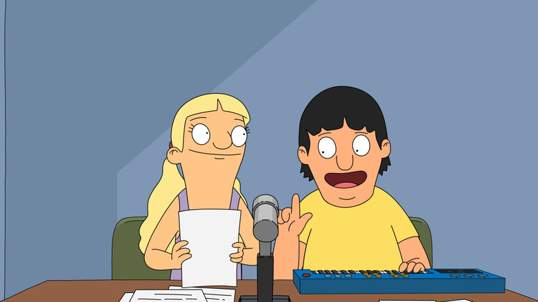 Gene and Courtney sit at microphone