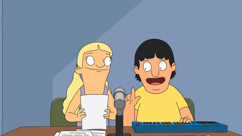 Gene and Courtney sit at microphone