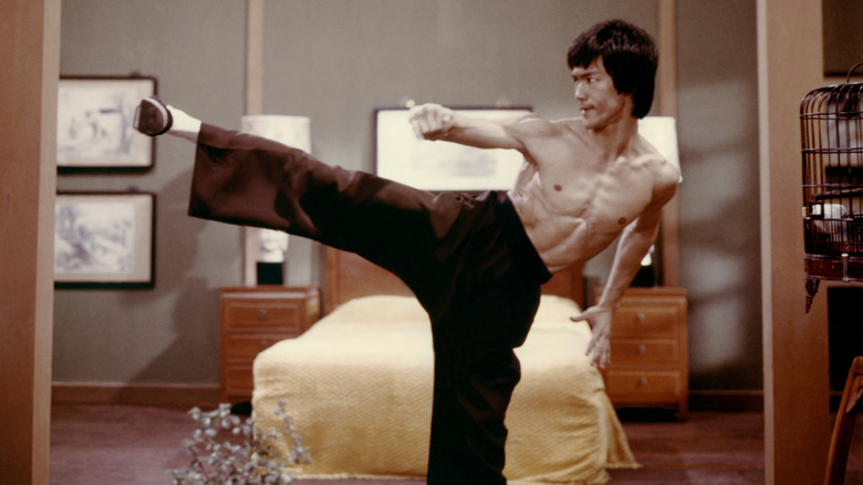 Bruce Lee's Lee tasting blood in Enter the Dragon