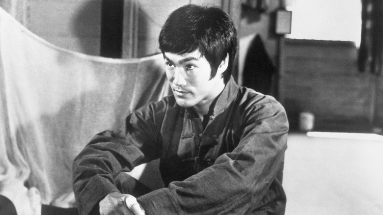 Bruce Lee's Lee looking serious in Enter the Dragon