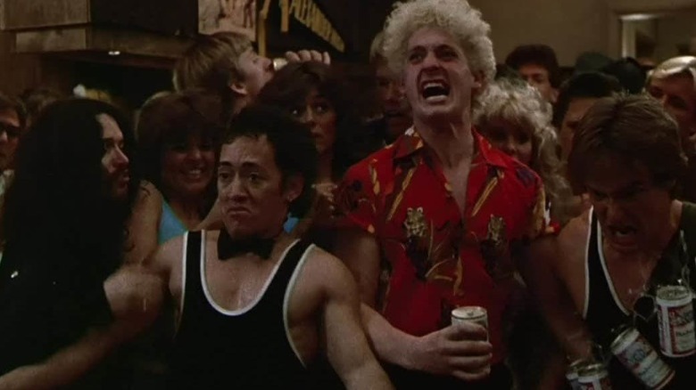 man wearing bow tie man wearing red shirt