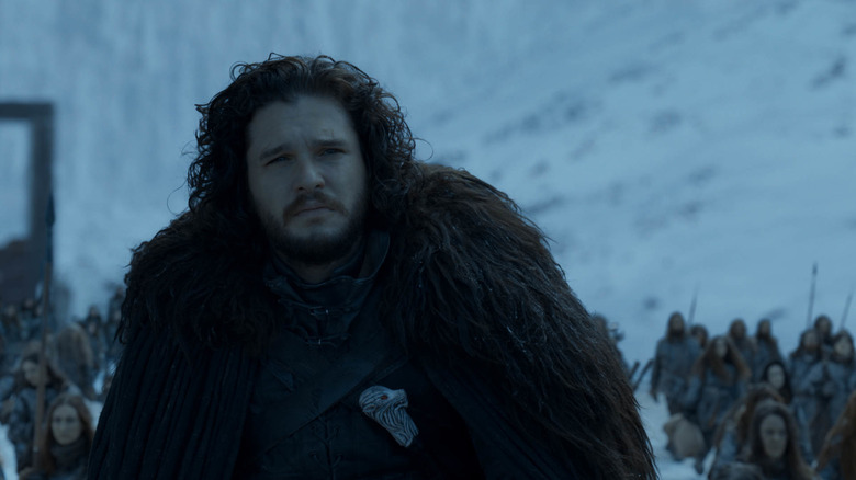 Jon Snow standing in the snow in Game of Thrones