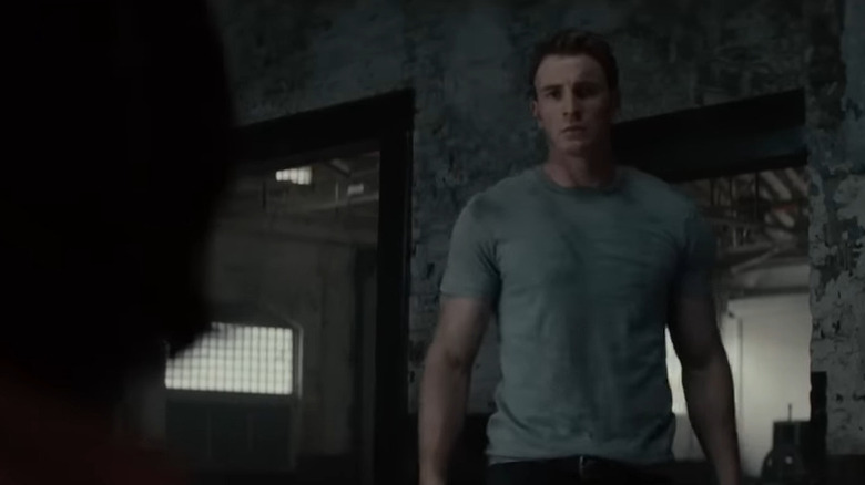 Steve Rogers (Chris Evans) in a shadowy compound in Ant-Man