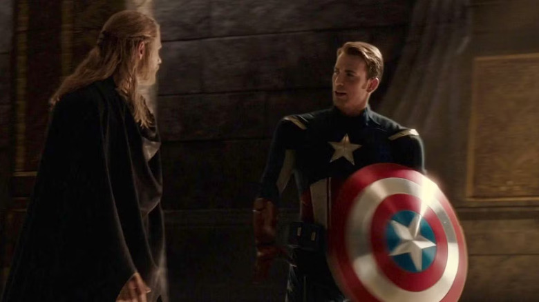 Thor (Chris Hemsworth) and Loki/Steve Rogers walking through Asgard in Thor: Dark World