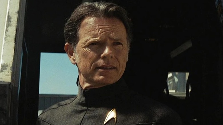 Christopher Pike (Bruce Greenwood) looks out a shuttlecraft in Star Trek (2009)