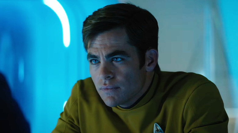 James T. Kirk (Chris Pine) leans forward thoughtfully in Star Trek Beyond