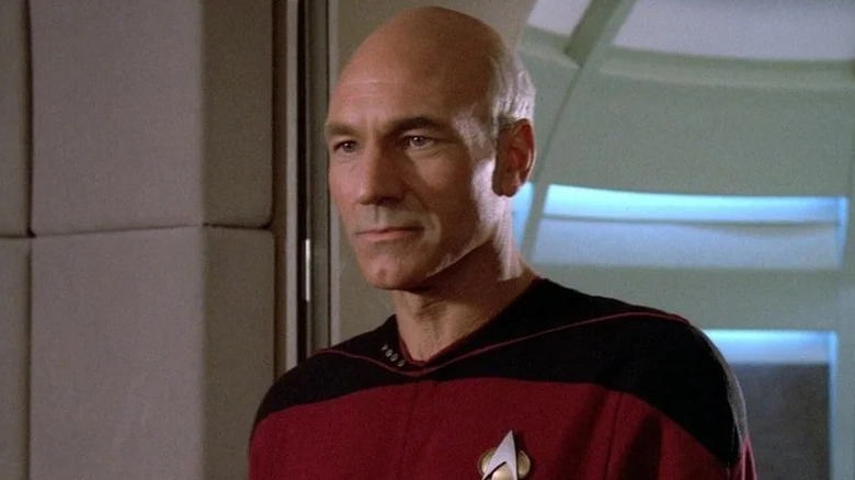 Jean-Luc Picard (Patrick Stewart) stands by the turbolift in Star Trek: The Next Generation