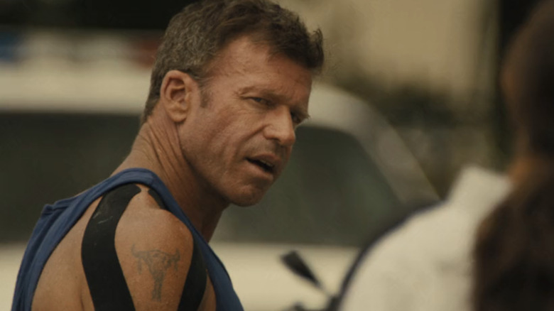 Taylor Sheridan's Cody Spears looks across the frame in Lioness