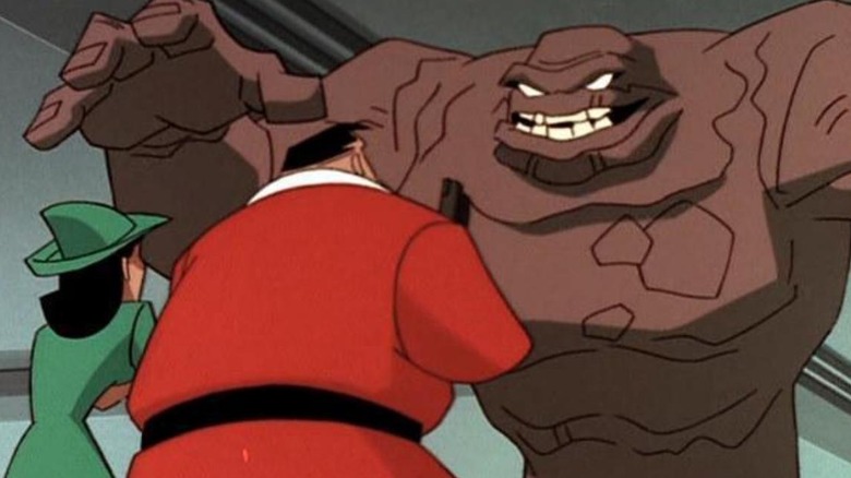 Batman: The Animated Series - Clayface leering over Montoya and Bullock (dressed like Santa and an elf)