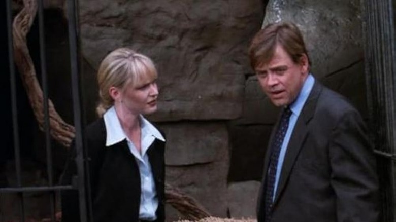 Lisa Wilcox as Grace and Mark Hamill as Murphy, investigating a murder in Watchers Reborn