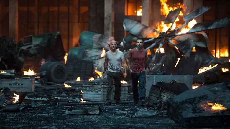 John and Jack McClane walk away from helicopter wreckage