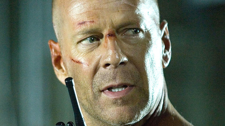 John McClane on a walkie talkie