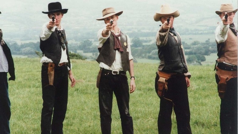 The cast of A Fistful of Fingers point guns