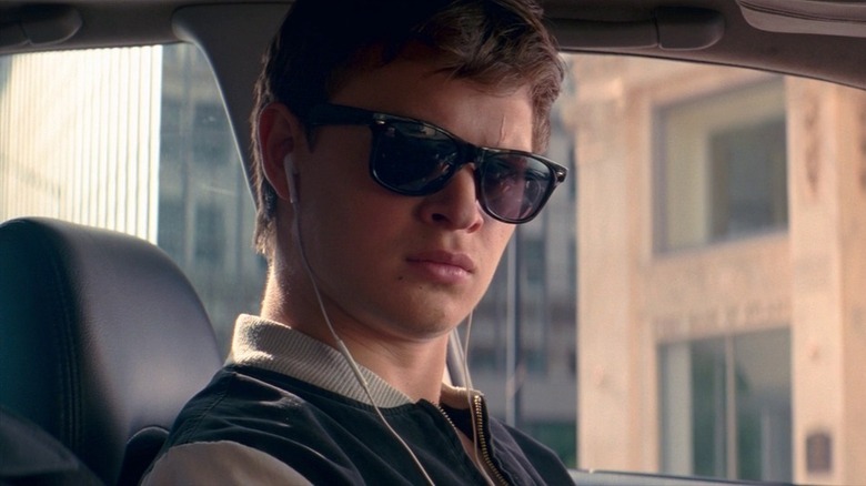Ansel Elgort in getaway car as Baby in Baby Driver
