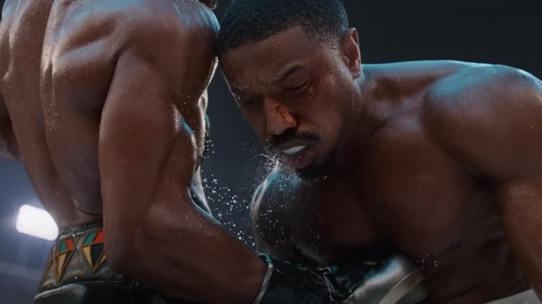 Damian Anderson body shot to Adonis Creed
