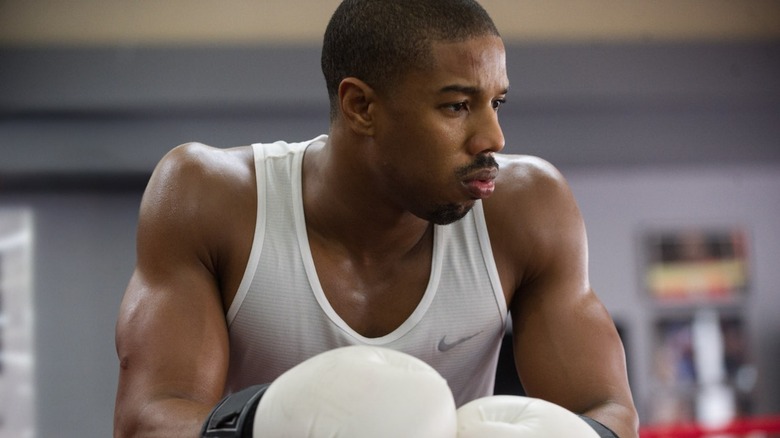 Adonis Creed white boxing gloves