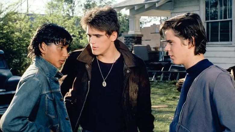 Ralph Macchio, Matt Dillon, and C. Thomas Howell in "The Outsiders"