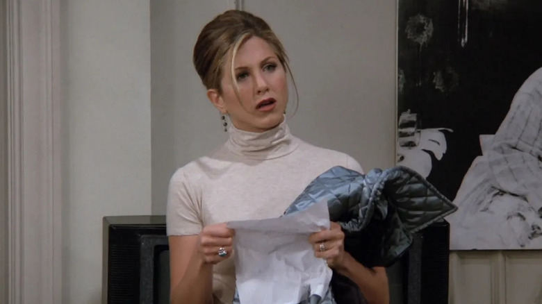 Rachel Green (Jennifer Aniston) holds a handwritten list in Friends