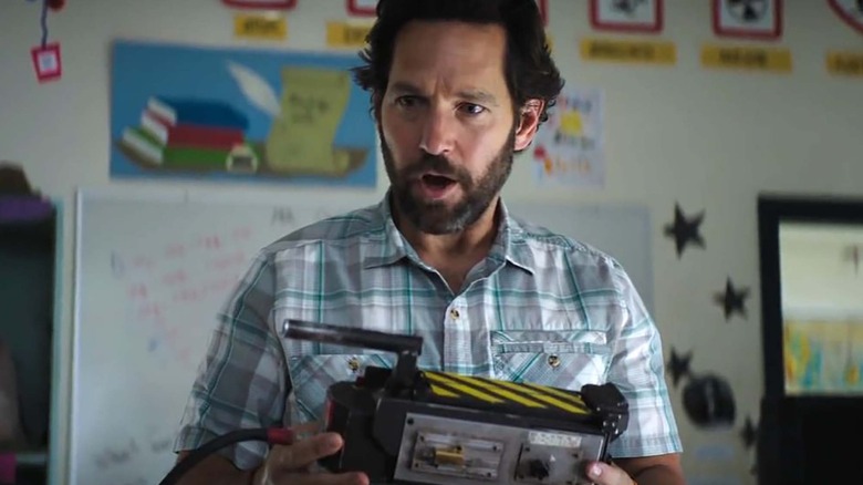 Paul Rudd holds a ghost trap Ghostbusters: Afterlife