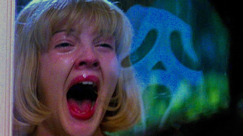 Drew Barrymore screams at Ghostface