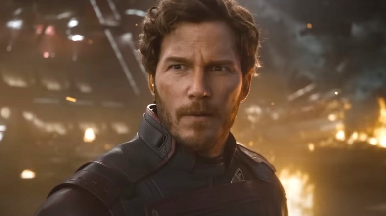 Peter in front of wreckage