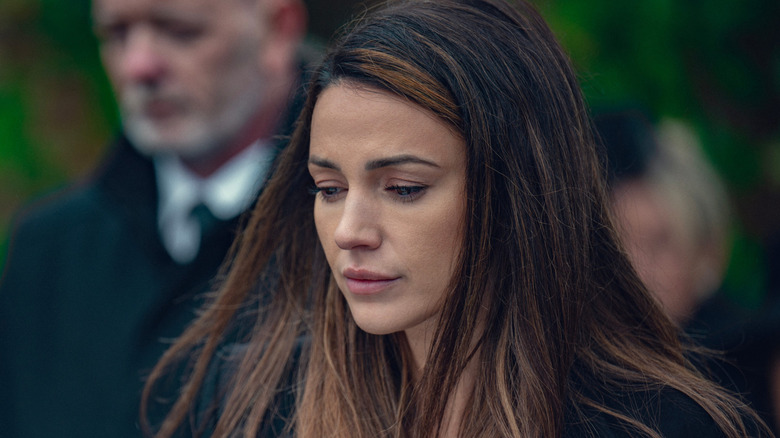 Michelle Keegan as Maya Burkett, mourning at a funeral in Fool me once