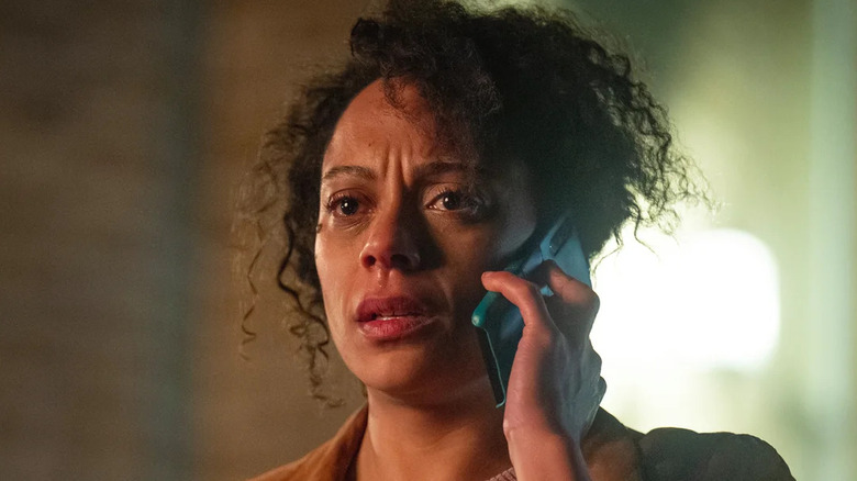 Rosalind Eleazar as Kat Donovan, taking a phone call on Missing You