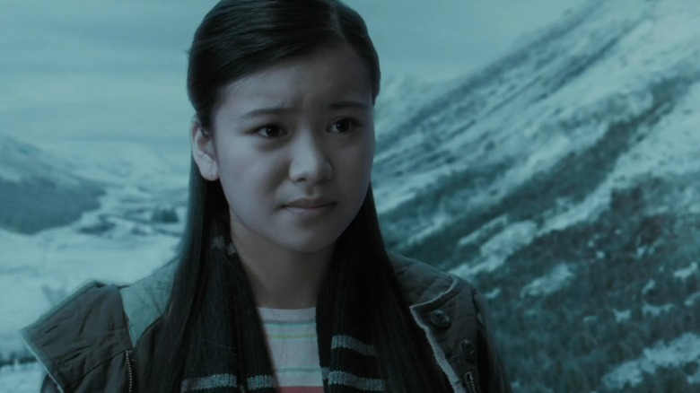 Katie Leung's Cho Chang looks concerned against a snowy landscape in Harry Potter and the Goblet of Fire